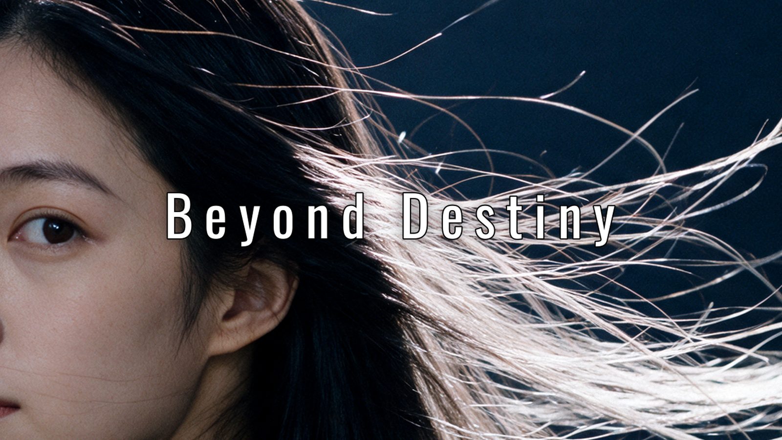 YURA in close profile, her hair blown across the frame against a deep blue night.